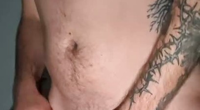 Inked guy soing Solo next to giant rosary