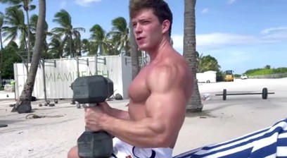 Muscle Guy Works Out on Beach