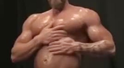 Hunky Guy Doing Pushups And Then Oiling Himself Up, Flexing, and Posing