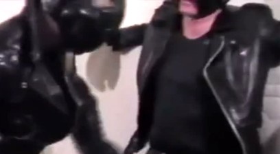 Two Leathermen Boxing