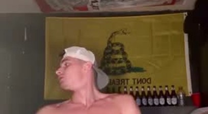 Muscular Dude Jacking Off Below The American Flag And In Front Of The Gadsden Flag