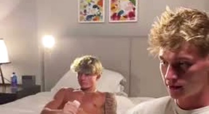 Two handsome hunks jerk off together
