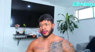 muscle glasses hunk with tattoos strokes cock on webcam