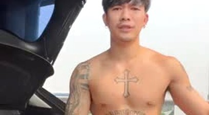 Asian guy wanking outdoors