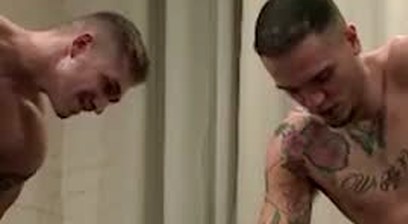 Two guys take stool in another guy's mouth