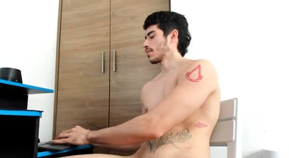 Hot Tattooed Latino Guy Stroking His Big Shaved Uncut Cock