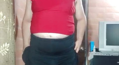 Sensual Latina transvestite undresses and masturbates with her white thong and her cock