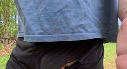 Straight amateur guy walks with dick poking out of exposed shorts