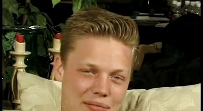 Curly blonde haired horny boy sucks balls and cock on the couch