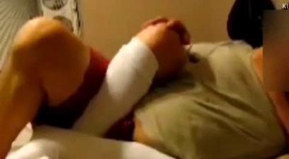 Two Guys Wrestling In Bed