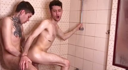 Tattooed lads fuck in the shower