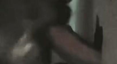 Sucking and swallowing a big cock at the gloryhole