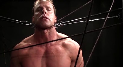 Derek Pain endures agony as his hanging cock gets bound tight