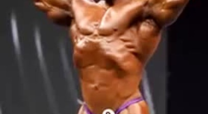 Regan Grimes Sexy Posing In Purple Posing Trunks