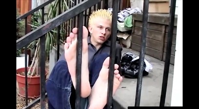 Ian Madrox teases with his feet in this steamy outdoor scene