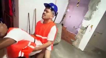 Construction workers, in a fit of lust, get together in the middle of the construction site. I