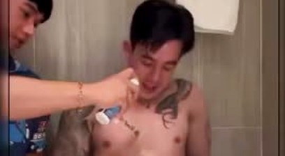 Muscle Asian gay couple