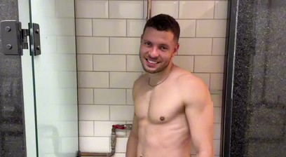 Well-endowed men playing around in the gym bathroom.