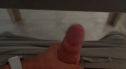 A young guy jerks off his dick while no one is home