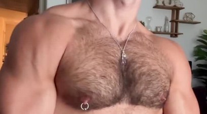 Muscled hunk sniffs own pits
