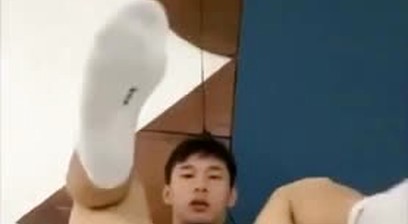 Chinese straight plays his asshole with toys