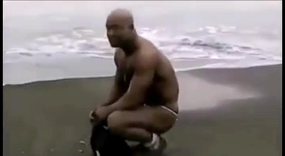 Asian Bodybuilder At The Beach In Various States Of Nakedness