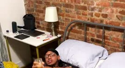 Caribbean man playing with toy