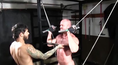 Gym basement torment and bondage for muscular hunk's submission