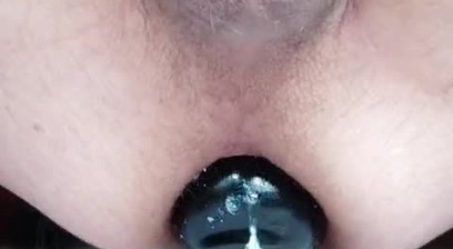 Riding butt plug and jerking off