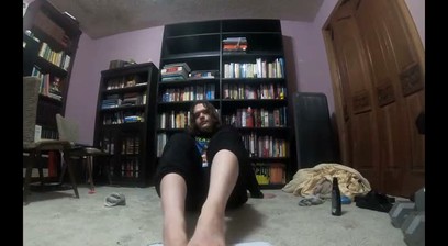 Chubby boy gives his dildo a footjob