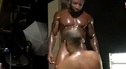 Two Muscular Black Guys Oil Wrestling