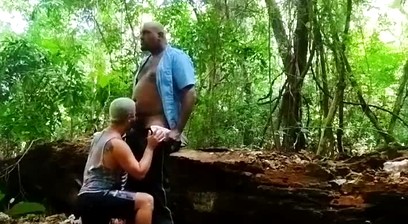 The short guy follows the bus driver to the park and gives it to him.